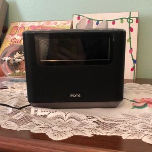 iHome speaker alarm clock with built in lights phone charger and Alexa